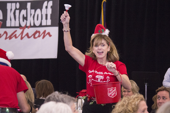 Peggy Welch runs around collecting money during the Salvation Army Dash for Cash at the Kettle Kick-off on Monday. Welch was part of the winning team for this part of the event.
Photo Credits: Katelyn Rowe IDS