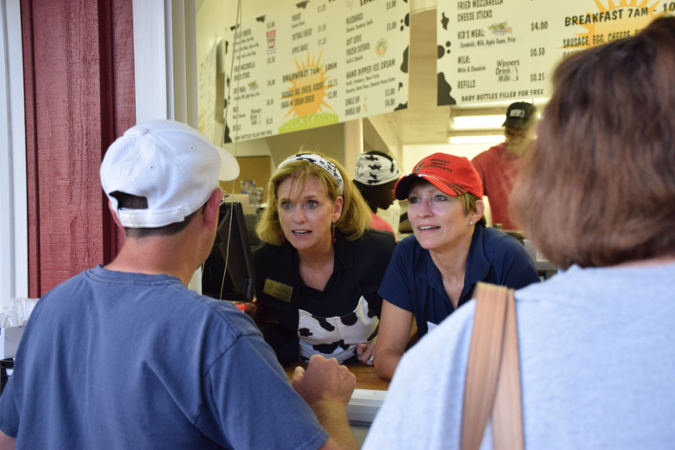 Peggy assisted her boss and friend, Lt. Governor Sue Ellspermann, at the 2015 Indiana State Fair Dairy Bar.