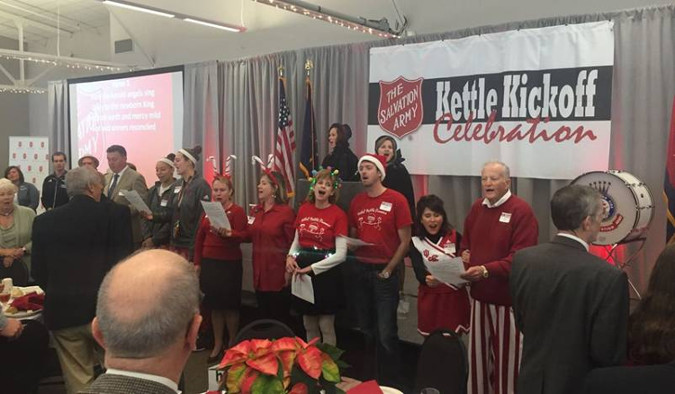 Red Kettle Picture:  Peggy and her son David had a great time again participating in the Bloomington Salvation Army Red Kettle Kick Off! November 2016.  Credit to Herald Times, Jonathan Streetman.