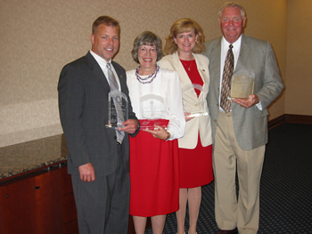 July 2004:  Peggy is pictured with State Representatives Scott Reske and Sue Scholer and State Senator Bob Meeks after they each were presented with the American Legion of Indiana Distinguished Public Service Award.